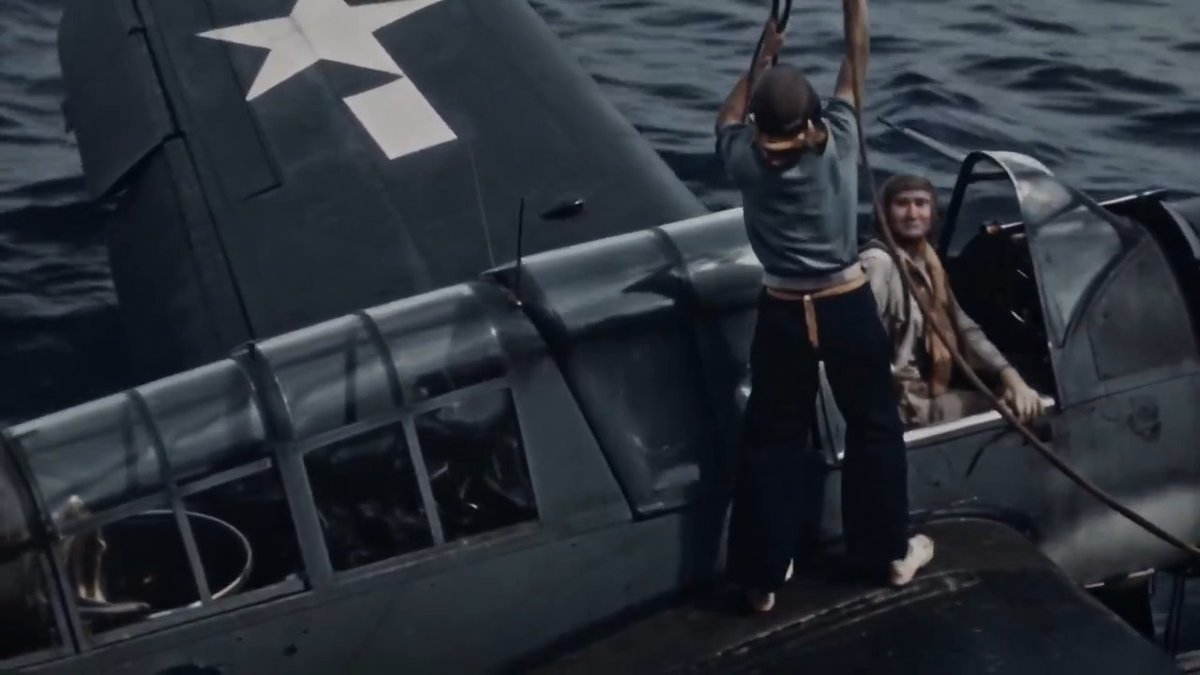 1940 Upscaled shots of the USS Chester, possibly near Pearl Harbor, launching and recovering aircraft, on the deck and out of the water, while a young SB2C Helldiver pilot hits the wire hard (looks like props hit the wood). Navy aviators gonna aviate.🤘😎