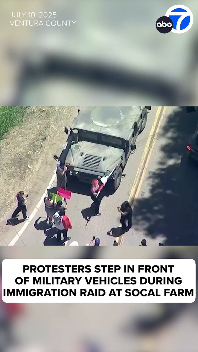 Demonstrators stepped in front of military vehicles during an immigration raid at a farm near Camarillo on Thursday. The standoff between federal agents and protesters grew intense as smoke canisters were thrown in multiple directions, sending people fleeing.