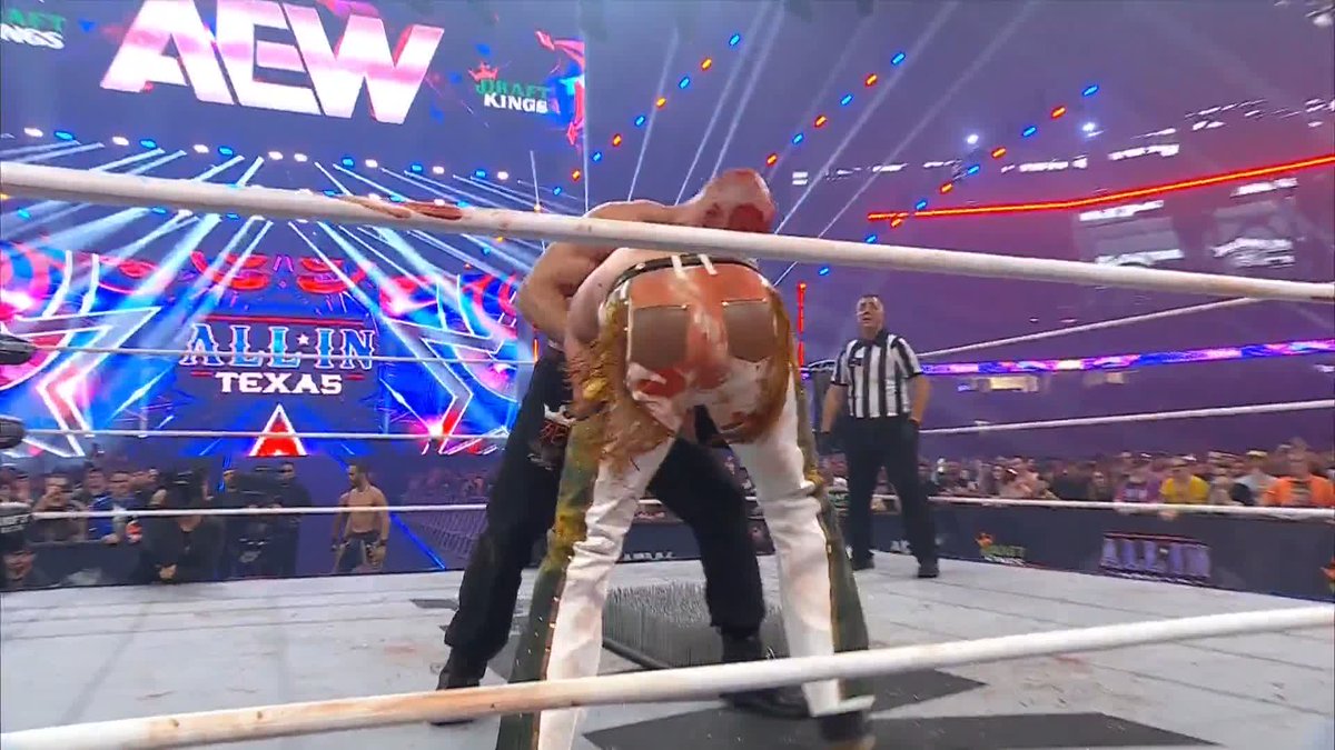 Moxley sends Hangman onto a bed of nails. #AEWAllInTexas