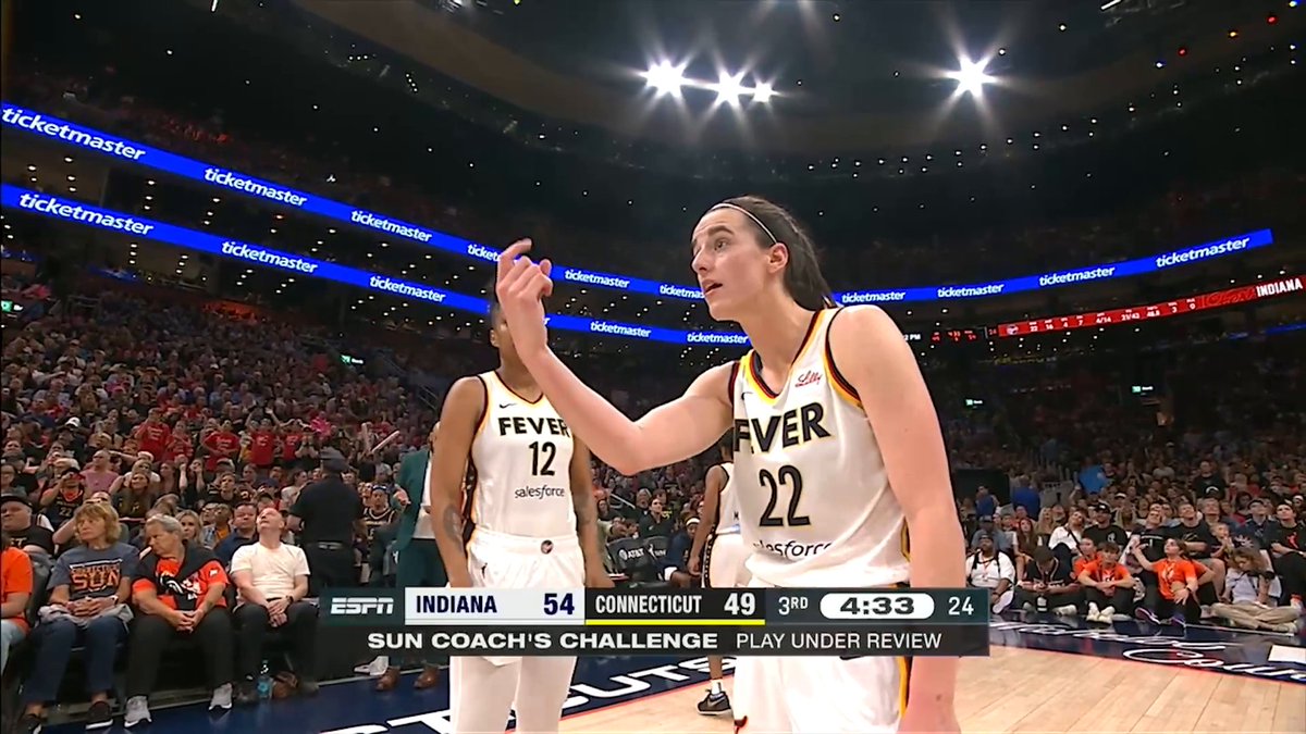 Caitlin Clark had words for the ref while the call was under review. The Sun's challenge was successful, giving Connecticut the ball.