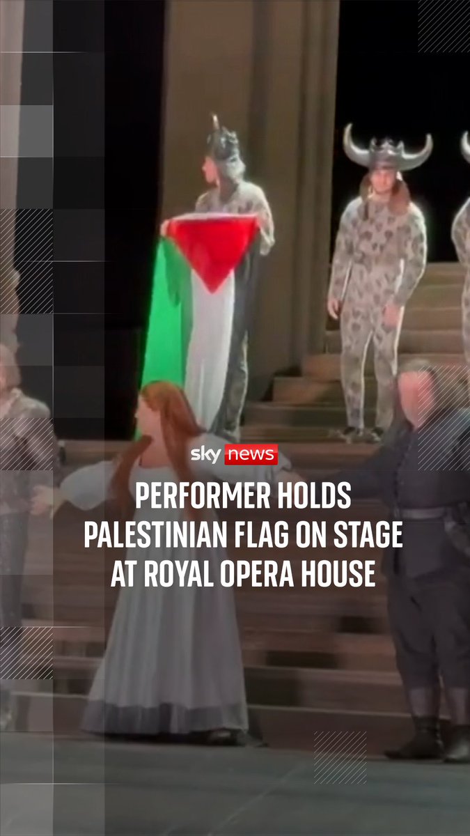 An official unsuccessfully attempted to stop a performer as they unfurled a Palestinian flag on stage at the Royal Opera House in London.
