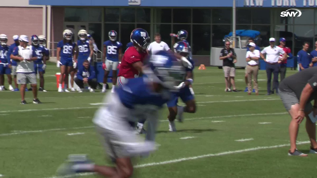 Paulson Adebo breaks up the pass attempt to Darius Slayton