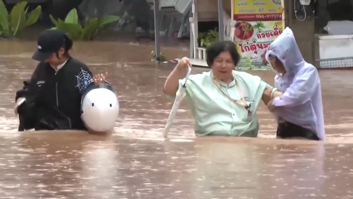 Tropical Storm Wipha triggered severe flooding in northern Thailand's Nan province, with residents wading through waist-deep muddy water as heavy rain persisted