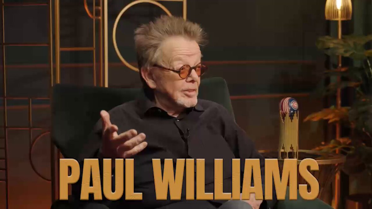 "In this episode of TMO, Billy Corgan sits down with songwriting legend Paul Williams for a free‑wheeling conversation that spans astrology, Williams’ nomadic childhood and early hormone therapy, his breakthrough at A&M Records, and the creation of “We’ve Only Just Begun”, sessions with the Wrecking Crew, trading quips with Johnny Carson on The Tonight Show, Williams’ roles in Battle for the Planet of the Apes and Brian De Palma’s cult classic Phantom of the Paradise, and his memorable “Love Boat” theme. Both reflect on struggles with addiction: Williams’ 1989 cocaine‑induced breakdown that led to long‑term sobriety and Corgan’s experience with his father’s substance abuse." Paul Williams