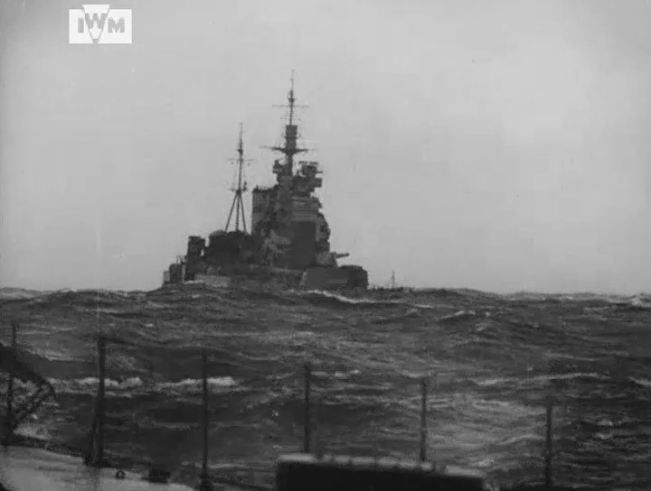 Rough seas filmed from the battleship HMS Duke of York during an Arctic convoy to the Soviet Union, 1942. Film: IWM ADM 545 <1/2>