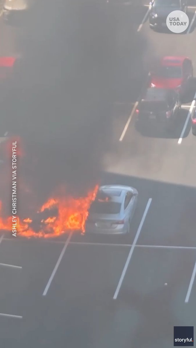 A car burst into flames and exploded in an Arlington, Virginia, parking lot, damaging two nearby vehicles. Officials say it was caused by an electrical issue. No one was seriously hurt.