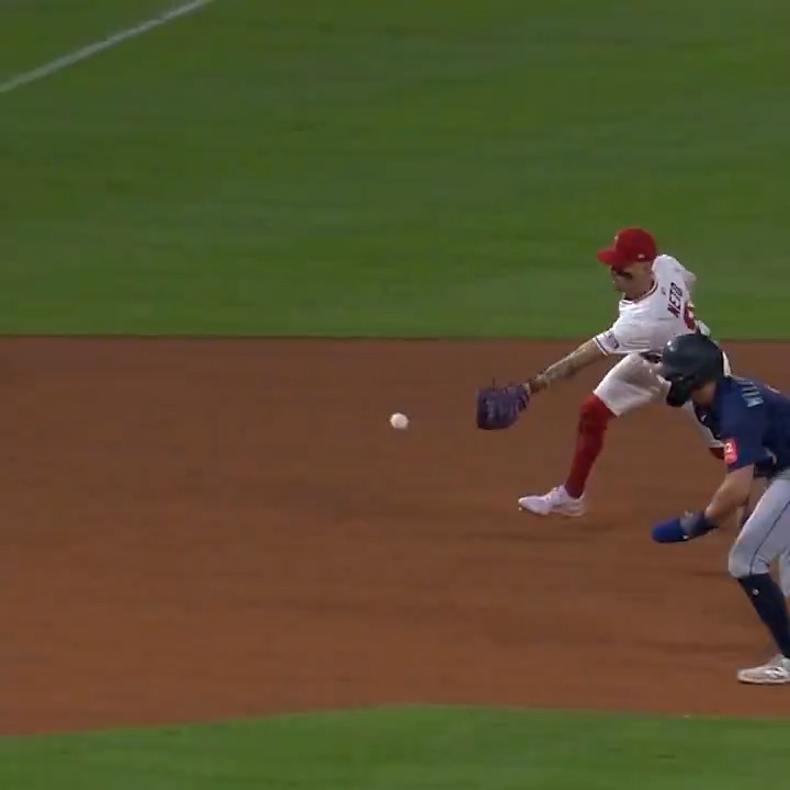 Zach Neto shovels this ball perfectly to get the lead runner at third base! 😱