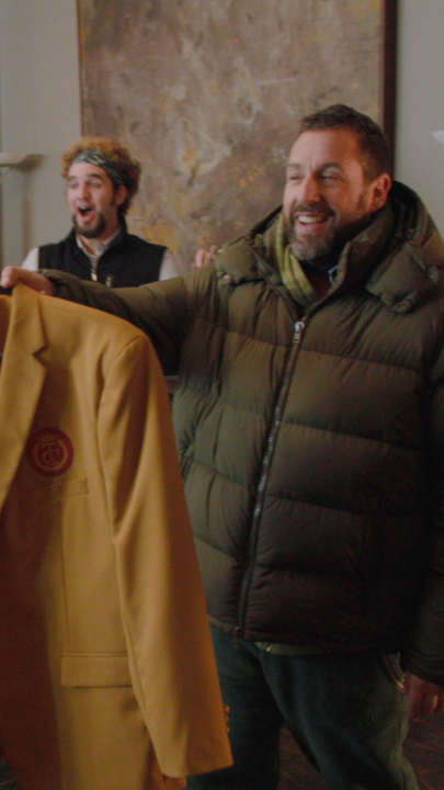 Adam Sandler gifts a gold jacket to Christopher McDonald on the set of Happy Gilmore 2