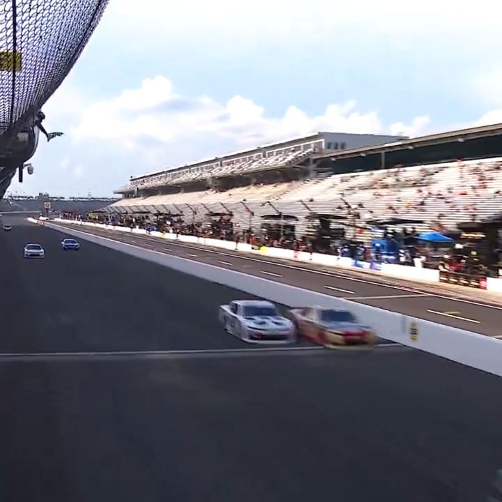 They are side-by-side at the line! Justin Allgaier wins Stage 2 at Indianapolis Motor Speedway.