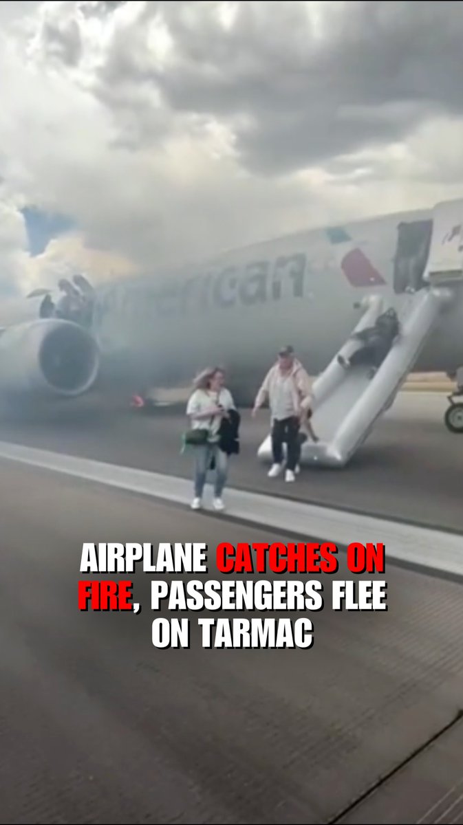 Passengers flee from a burning airplane on the tarmac at Denver International Airport. Everyone made it off, and one person was transported for medical attention for a minor injury, American Airlines said.