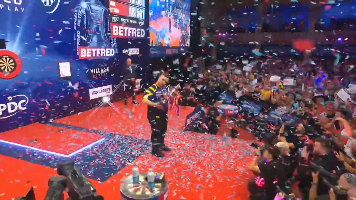 What a performance. What a player! 👏 Luke Littler lifts the iconic Phil Taylor Trophy for the first time in his young career!