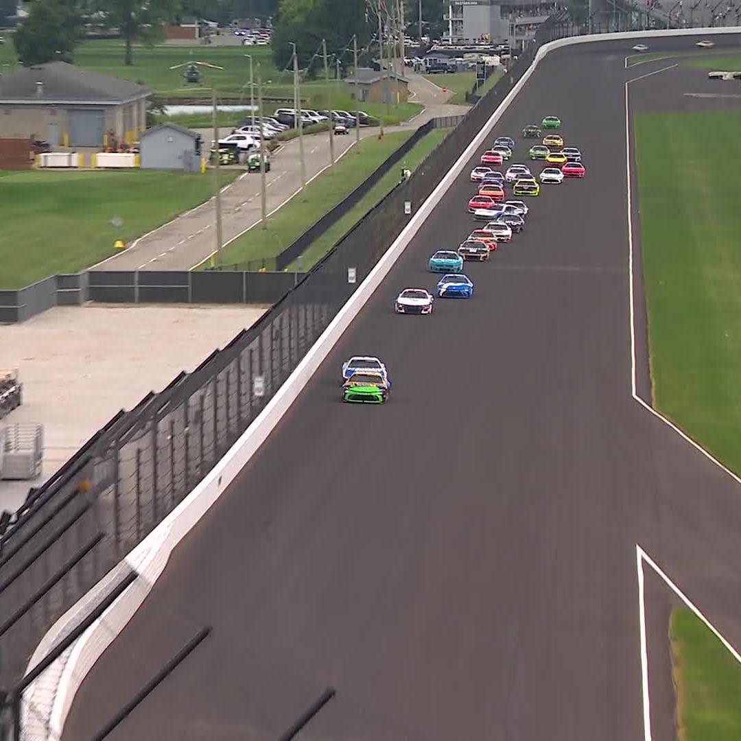 There's trouble down the backstretch! Several cars are involved.