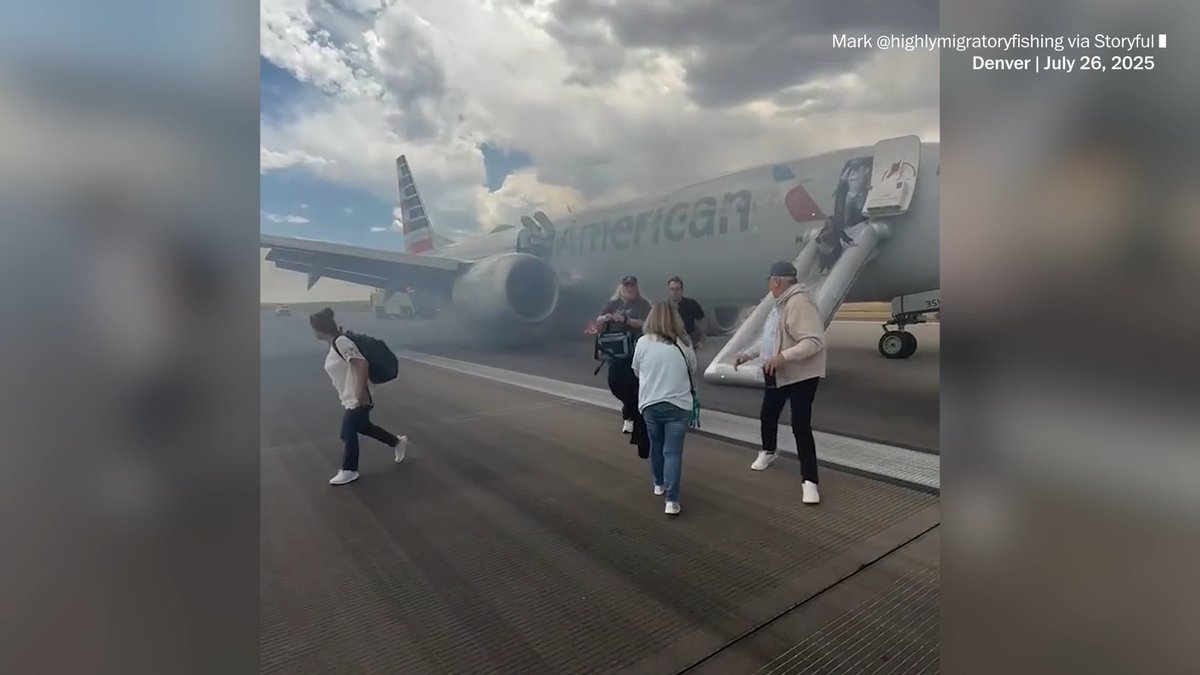 More than 170 passengers evacuated an American Airlines plane at Denver International Airport on Saturday, using emergency slides amid swirling smoke from a small fire. The Federal Aviation Authority said in a statement that it would launch an investigation and that the flight had reported “a possible landing gear incident.”