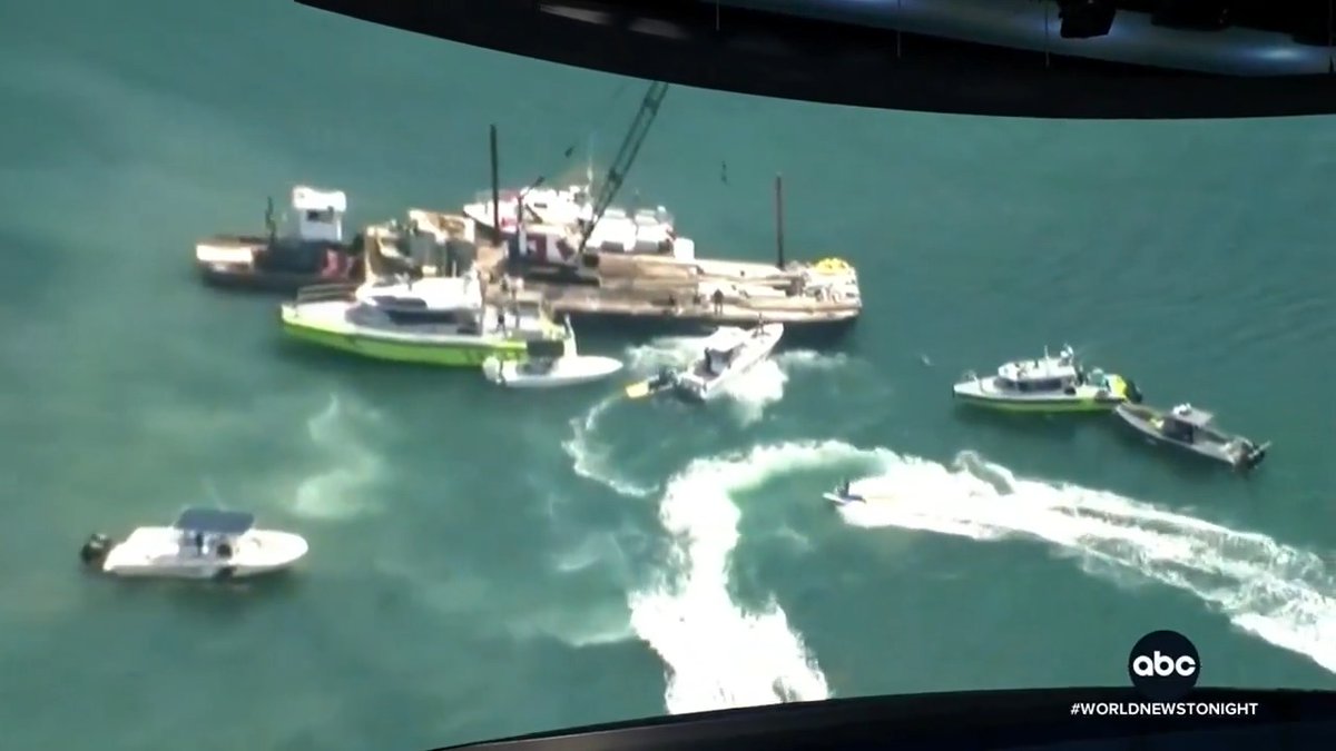 A barge off Miami Beach struck a youth sailing program's sailboat, throwing overboard all five children and one adult on board, according to officials. At least two children have died, and two others are in critical condition. Perry Russom is on the scene.