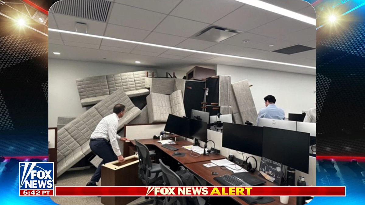 JUST IN: Photo shows employees barricaded themselves in New York City building during deadly active shooter situation.
