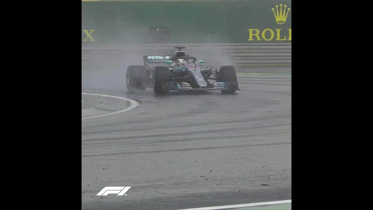 Lewis Hamilton taking pole position in heavy rain in Hungary