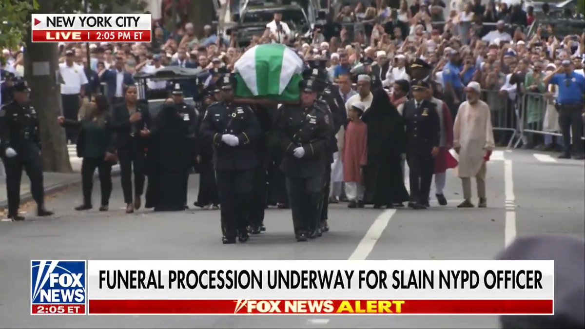 The family of Didarul Islam, the NYPD officer killed in the Manhattan shooting, including his father, joined the funeral procession as his casket was carried through the streets of New York City, surrounded by fellow officers paying their respects.