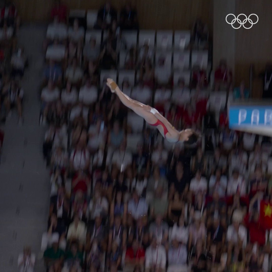 The amazing synchronization of Chen Yuxi and Quan Hongchan winning the Olympic Gold in the women's synchronized 10 m platform diving.