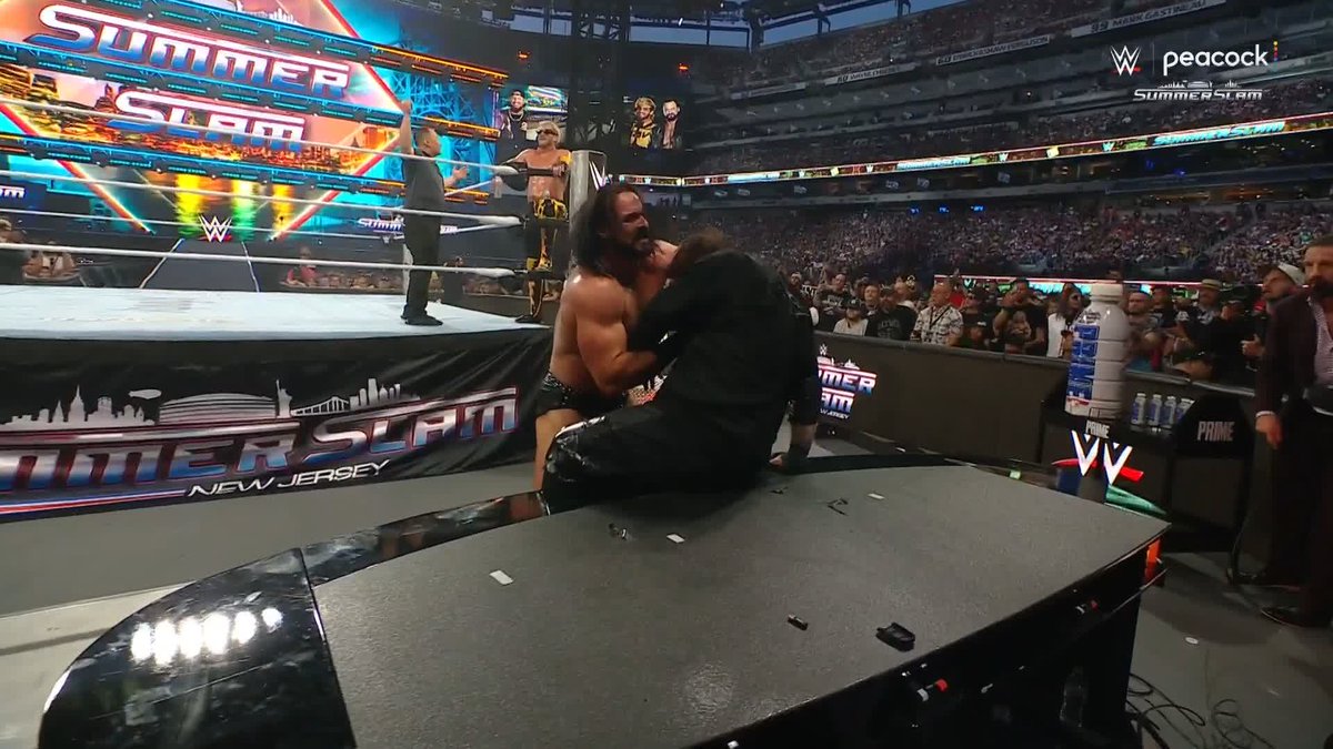 Logan Paul just SOARED onto Jelly Roll and crashed through the announce table at SummerSlam! 😲