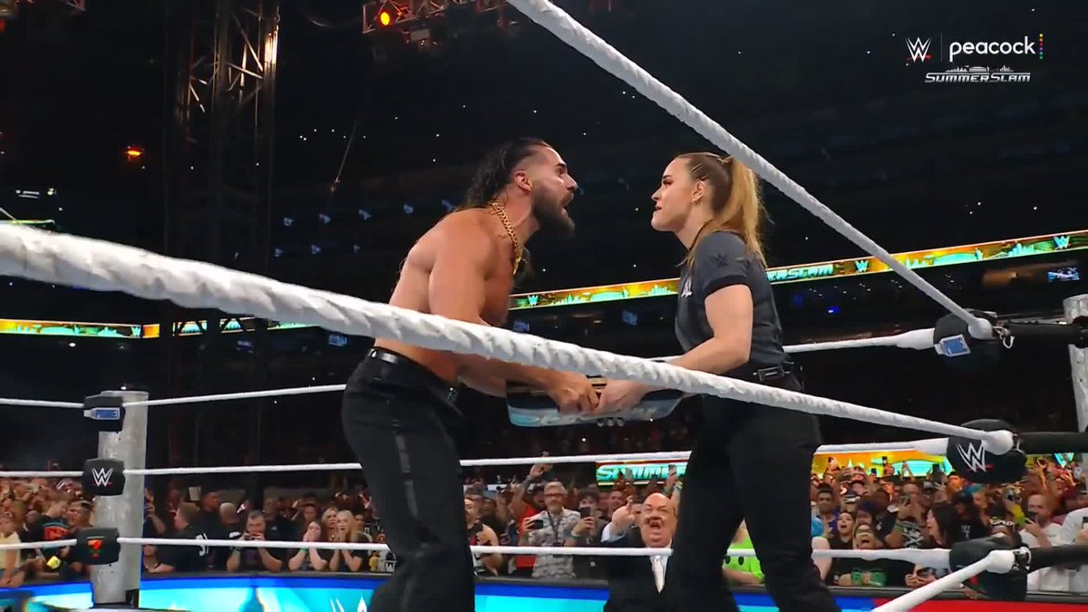 THE RUSE OF THE CENTURY! 😲 Seth Rollins just cashed in on CM Punk and just became the new WWE World Heavyweight Champion at SummerSlam!