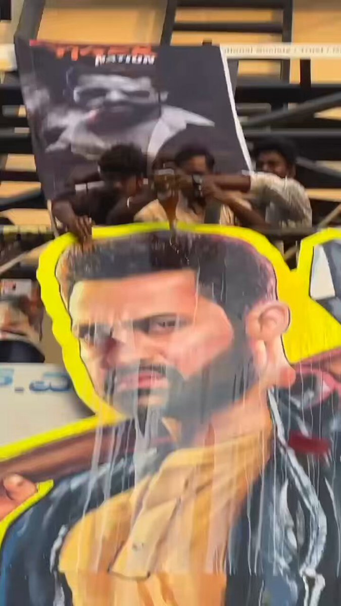 Fandom at its PEAK💥 Fans showering Jr NTR’s 55-ft cutout with milk, mansion house, and unstoppable emotion ❤️ This isn’t celebration, it’s a MASS CULT🥁💥🙏🔥🔥🔥 #War2 #War2Celebrations #BallariWAR2Celebrations Yash Raj Films