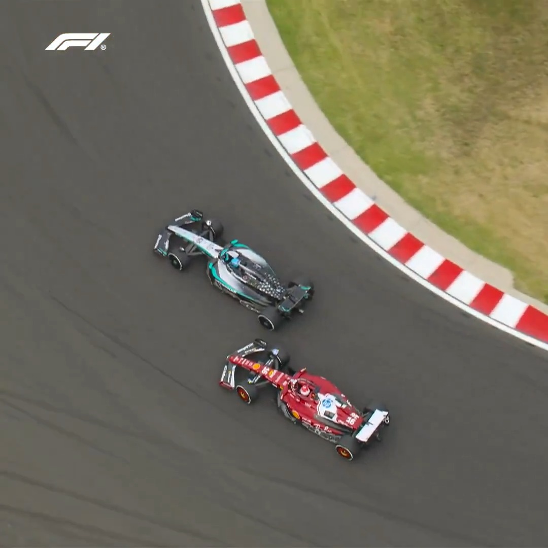 So close to contact! 😵 Russell gets past Leclerc and into the podium places 🥉 #F1 #HungarianGP