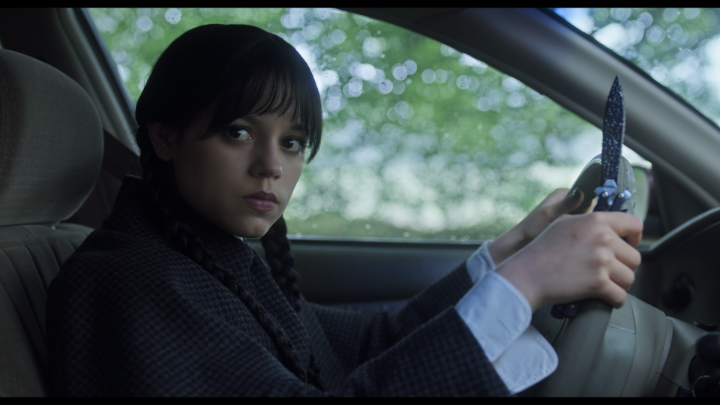 Wednesday Addams steals a car.
