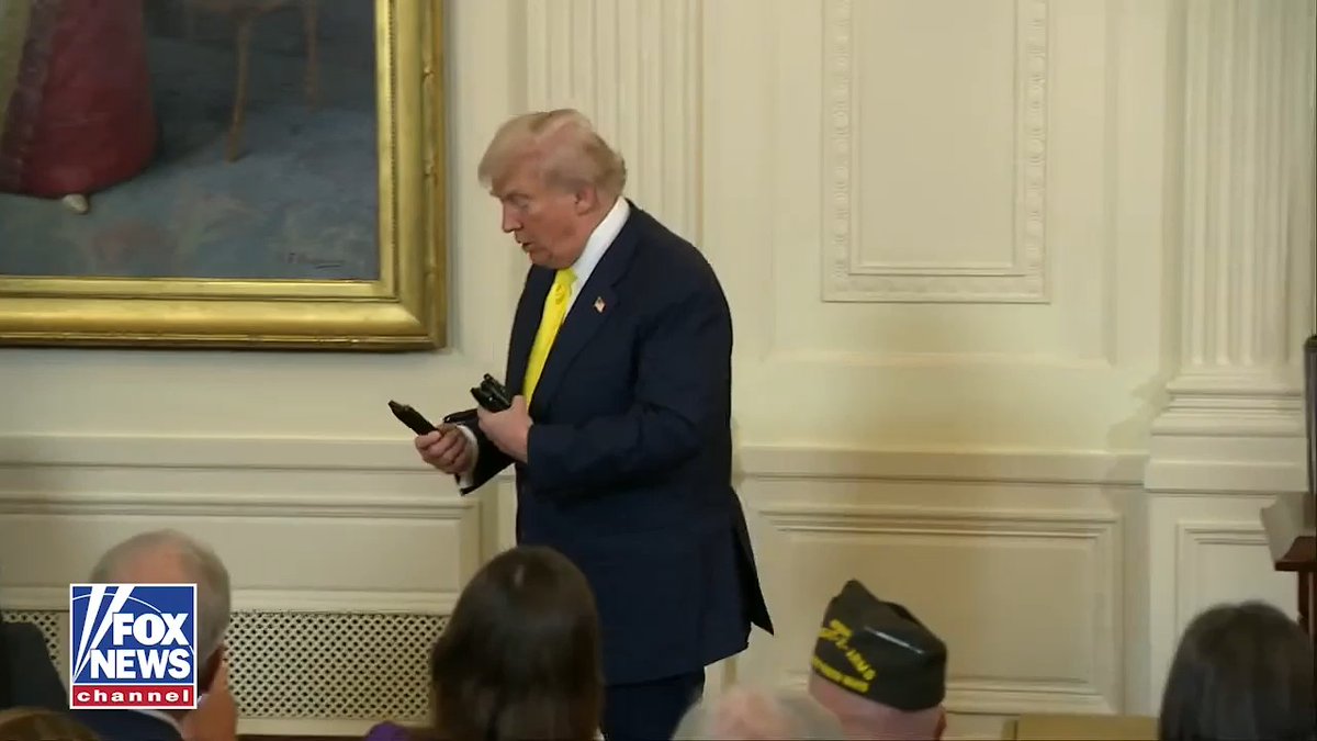 President Trump hands out pens to American heroes after officially declaring today 'National Purple Heart Day.'