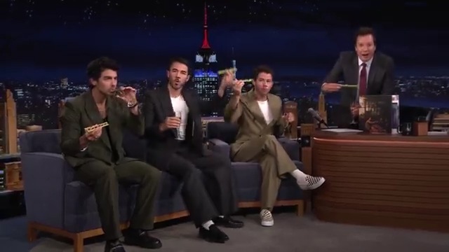 .Jonas Brothers and Jimmy cheers to Greetings From Your Hometown and JONAS 20 with champagne and ants on a log! 🐜 #FallonTonight