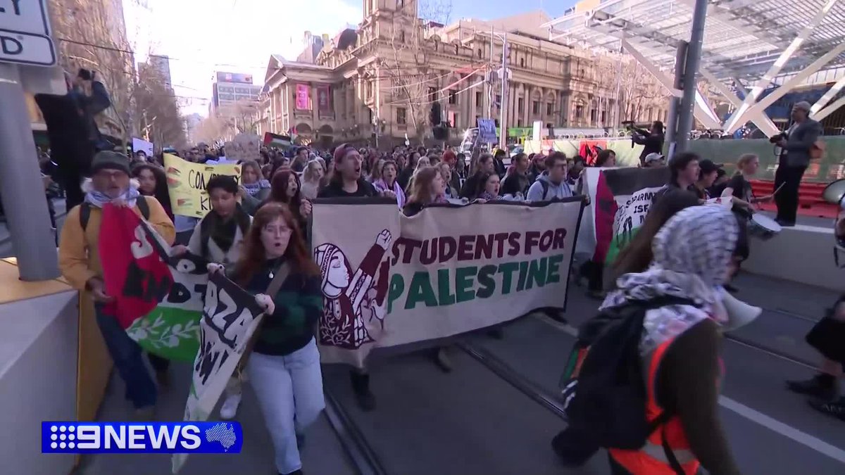 Melbourne, Australia (Aug. 7) — Leftist university and high school students shut down Melbourne's central business district "for Palestine." A counter-protester who displayed an Australian flag was sucker-punched by a green-haired leftist radical.