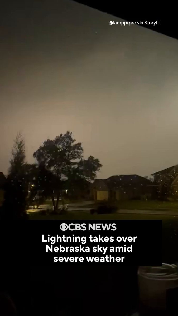 Lightning was seen illuminating the sky over Ashland, Nebraska, early Saturday as severe weather brought winds of up to 80 mph through the region.