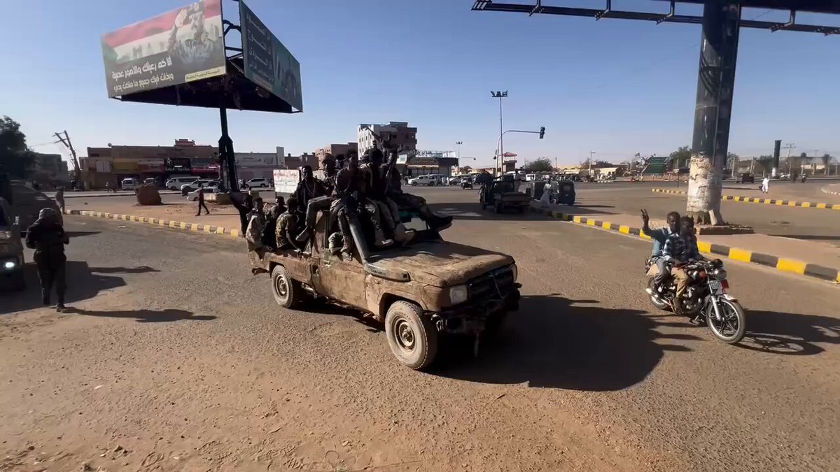 Al-Manara Roundabout, Omdurman, Aug 10: Members of Al-Baraa Bin Malik Brigade, an Islamist paramilitary allied with Sudan's military, accompany their commander Al-Misbah Abu Zaid Talha following his arrival from Egypt, where he was detained for a week for unspecified reasons.
