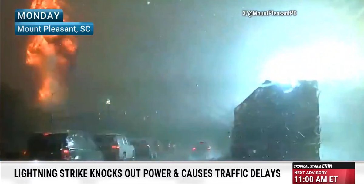 A dash cam captured the explosive moment lightning struck a power pole in South Carolina during a rainy commute. Watch:
