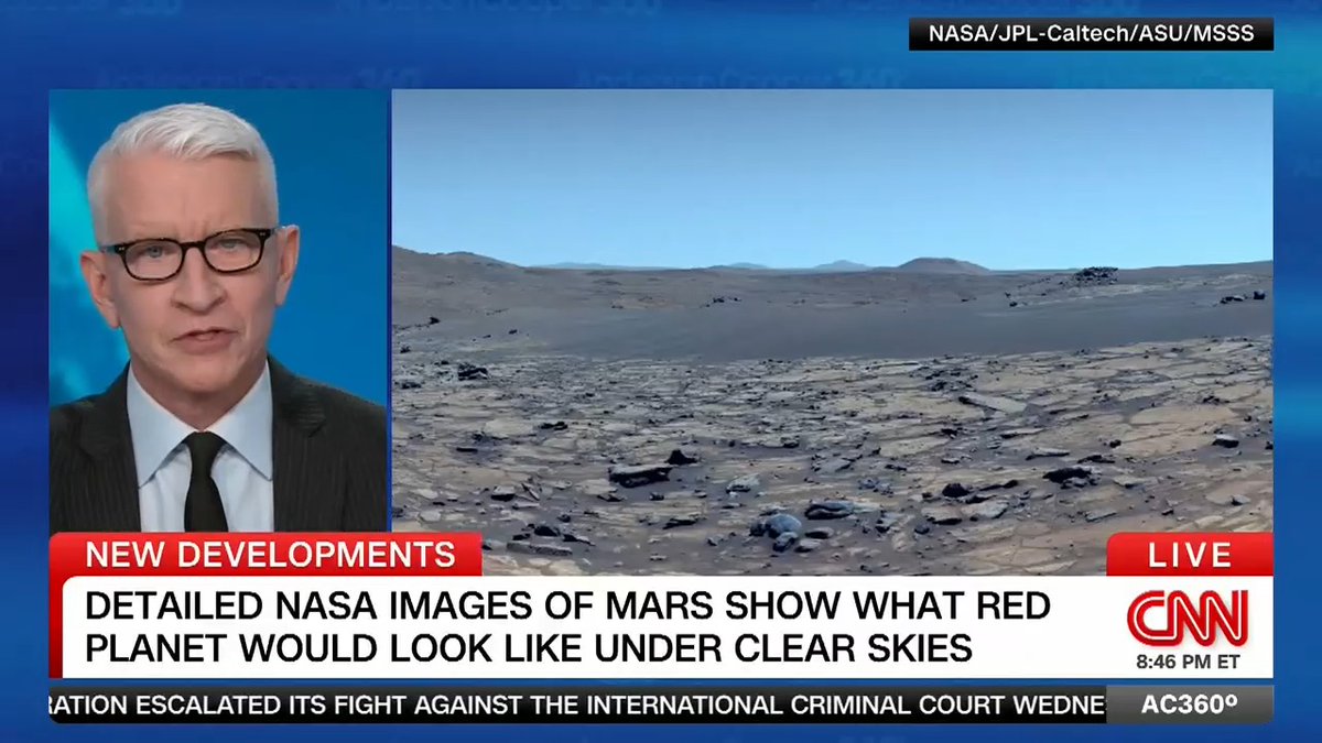 "It tells a story": Former NASA astronaut Mike Massimino reacts to the latest "enhanced" images from Mars that show what the red planet would like under clear blue skies.