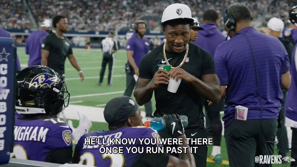 Coach zay flowers on the sideline