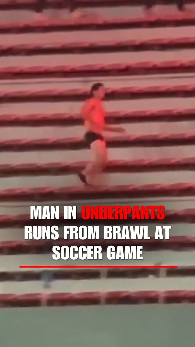 WATCH: A man heads for the exit in nothing more than his briefs as a massive brawl involving dozens of fans shuts down a soccer game.