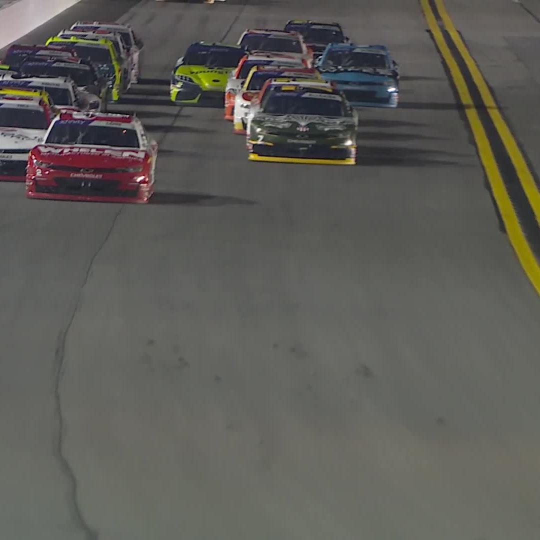 We are three-wide for the lead! The No. 8 gets turned!