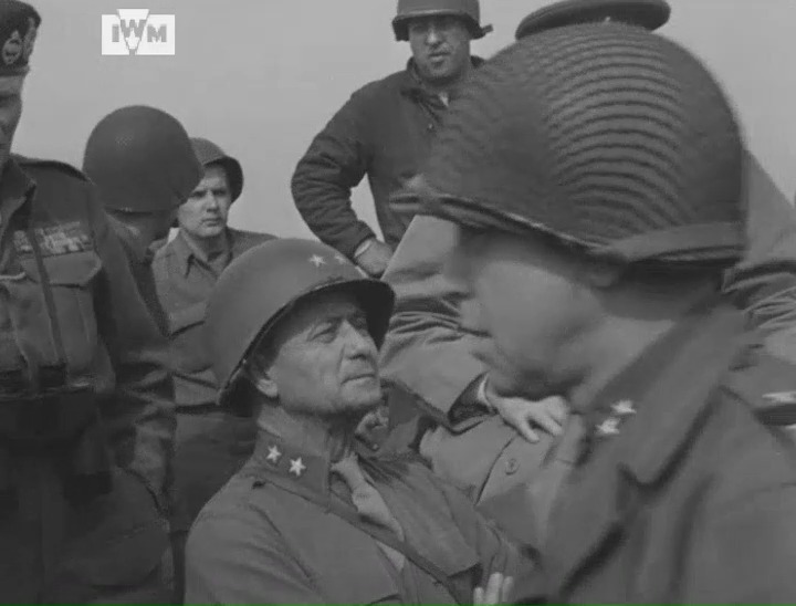 Churchill crosses the Rhine in an LCI (Landing Craft Infantry) with Field Marshal Bernard Montgomery and General Bradley, 25 March 1945. He is also filmed visiting a destroyed Rhine bridge and views the ruined townscape of Wesel. Film: IWM A70 277-1