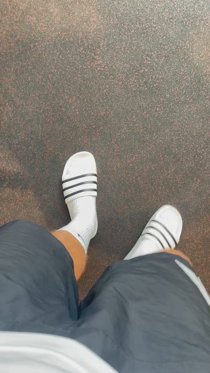 Workout in Adidas Slides. 💪🏻🏋🏻 Who wants to bow down and kiss my feet at the gym? 👇🏻🙇🏻‍♂️ #slidesandsocks #whitesocks #kissmyfeet #gymsocks #dominat