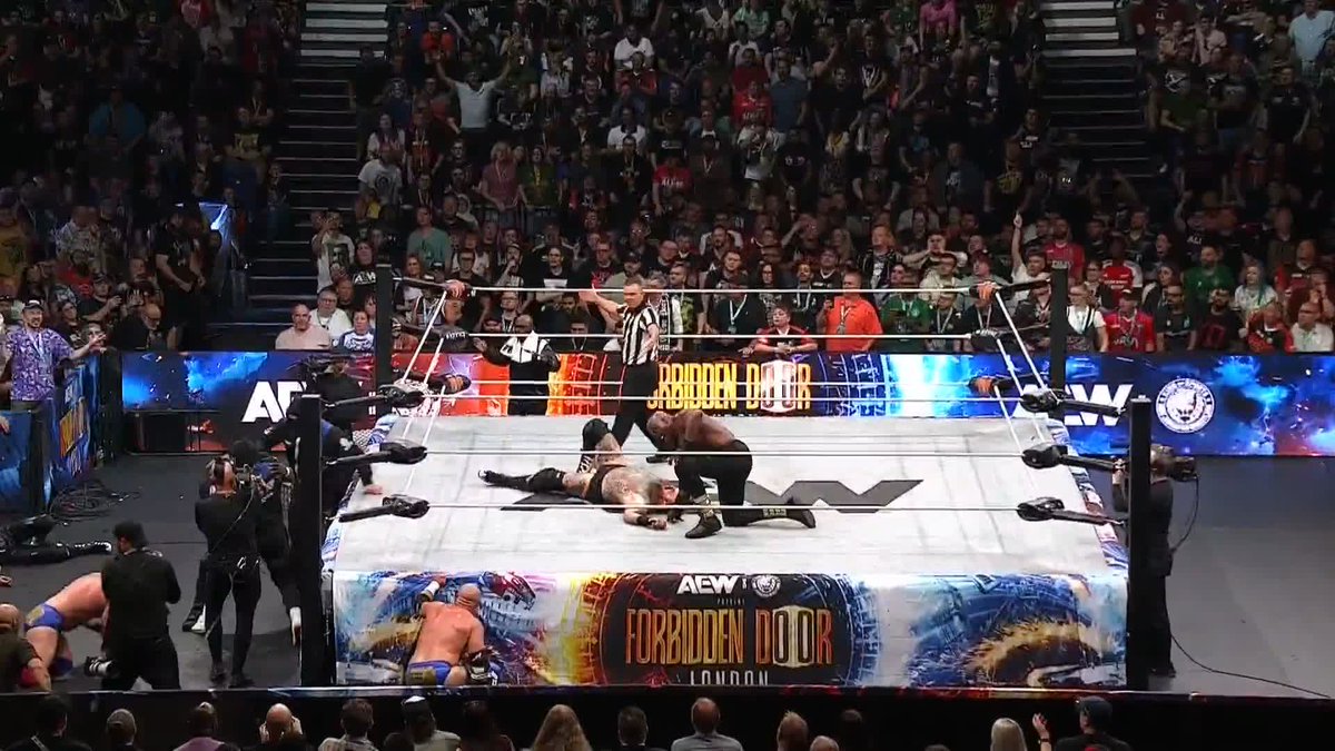 Who is this?! 👀 The Hurt Syndicate Bobby Lashley & Shelton J. Benjamin being taken out! Watch #ForbiddenDoor on PPV right now!