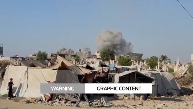 WARNING: GRAPHIC CONTENT Fire lit up the sky and buildings were reduced to rubble as Israeli tanks and planes launched overnight attacks on the Zeitoun, Sabra and Shejaia suburbs of Gaza City