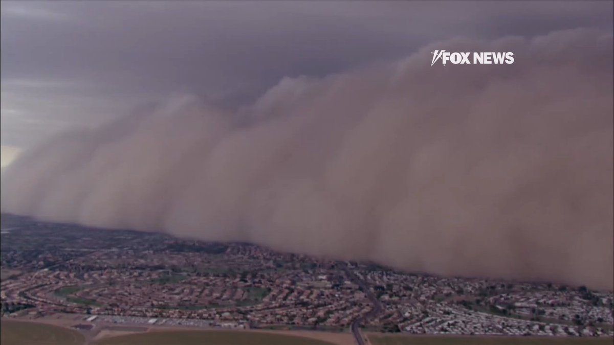 Dust storm blankets everything in its path as it rolls through the Phoenix, Arizona, area.