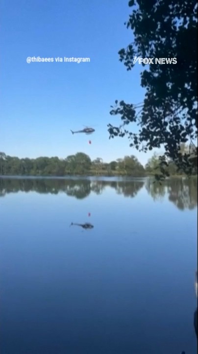 WATCH: A helicopter crashes into a pond while attempting to scoop water to battle a fire. The pilot, an officer and a witness were hospitalized — thankfully, no fatalities were reported.