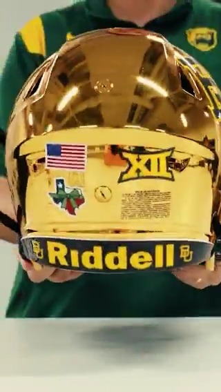 Standing together and wearing our hearts on our helmets 🎗️ A green ribbon over the state of Texas in memory of the victims and all those impacted by this summer’s devastating floods. #SicEm | #TexasStrong