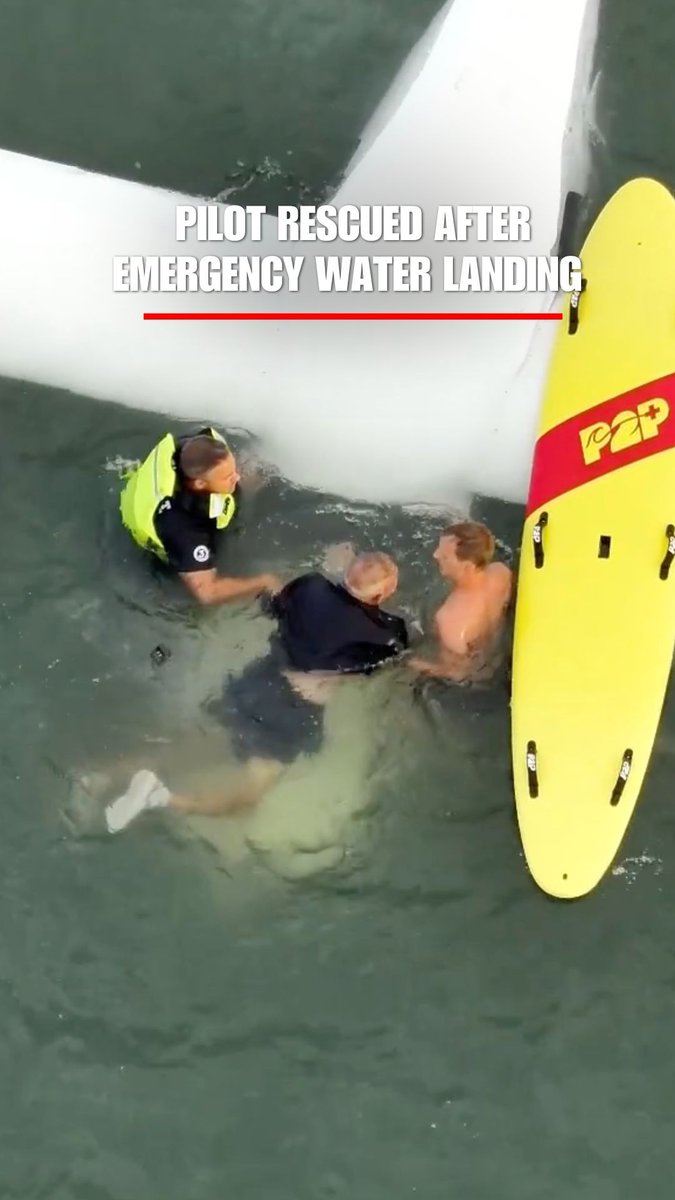 Rescue crews rushed to save a pilot after his plane overturned during a failed emergency water landing.