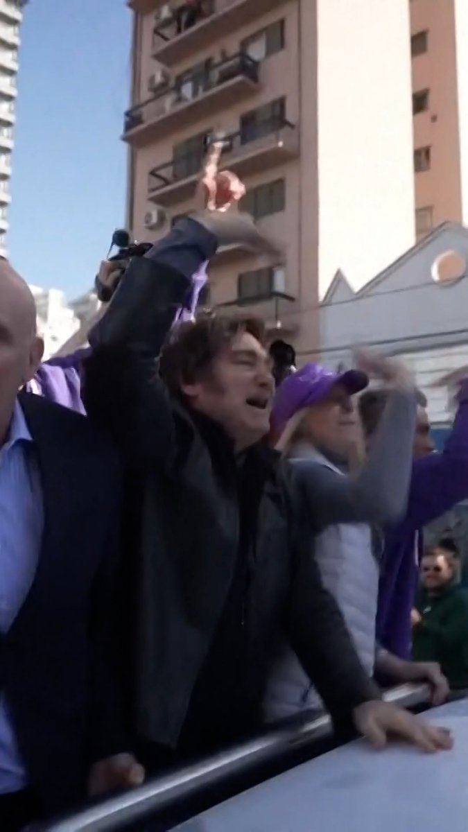 Argentine President Javier Milei was pelted with stones, bottles and vegetables as people chanted, "Out with Milei!", during an election rally.