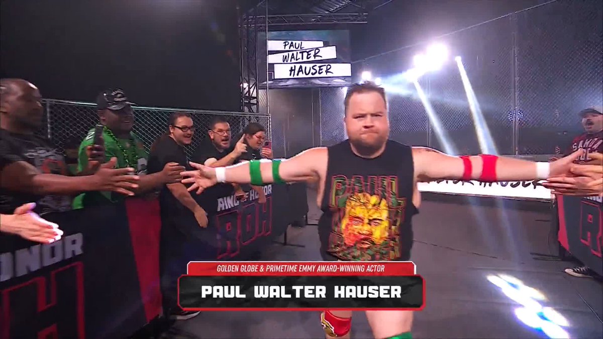 Paul Walter Hauser makes his entrance at ROH Death Before Dishonor for his match against QT Marshall with You Can't Stop Me by Andy Mineo as his theme music
