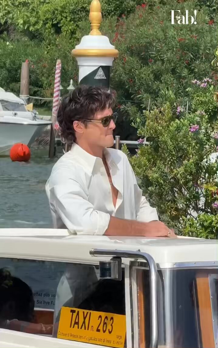 lui aveva un completo bianco, cinque chilometri di gambe e tre metri di pesce bravo!