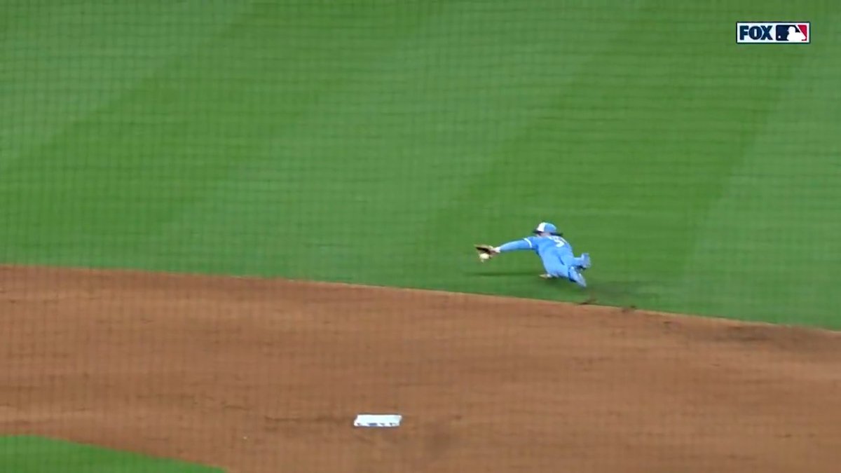 Bobby Witt Jr. takes away a hit with a superb diving stop!