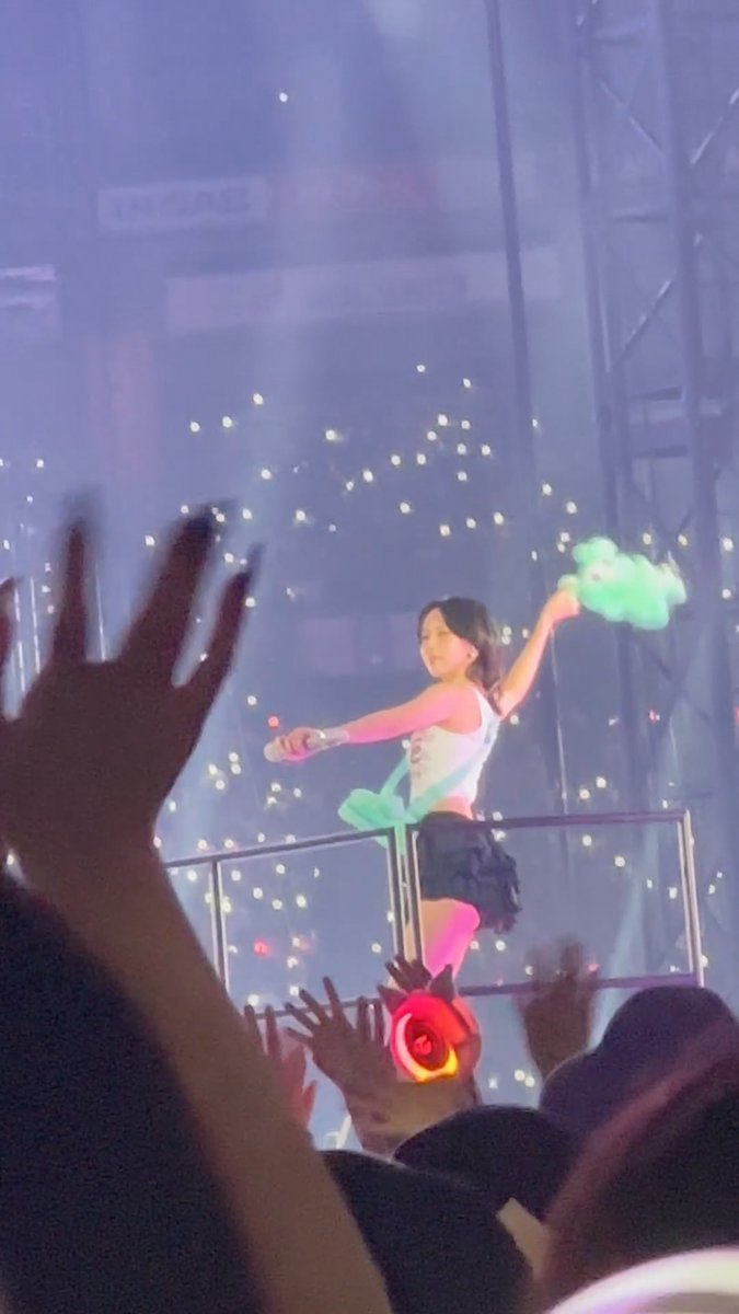 Mina throwing Mively into the crowd